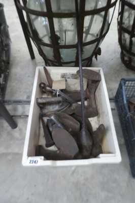 Lot 2247 - Crate of cobbler's lasts, flat irons, etc.