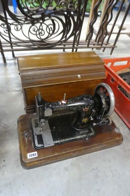 Lot 2283 - Bradberry's family manual sewing machine in...