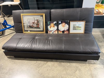 Lot 1127 - Black leatherette upholstered 2 seater sofa on...