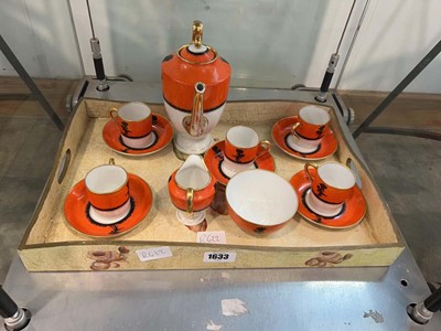 Lot 1633 - Japanese orange and gilt rimmed tea service