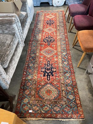 Lot 1654 - Figured and bordered woolen hall runner on a...