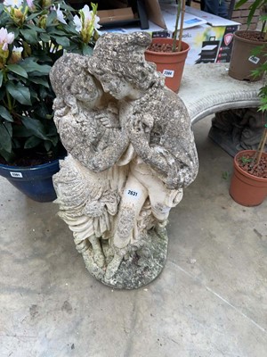 Lot 2631 - Weathered concrete statue of lady and man