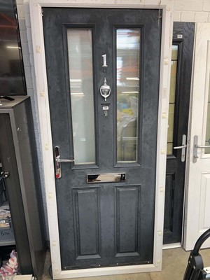 Lot 2724 - Black composite external door in frame with key