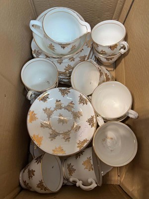 Lot 1684 - Box containing gilt rimmed bone china tea service