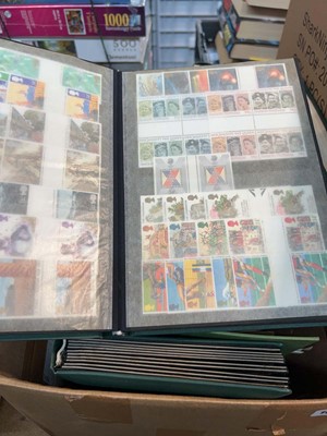 Lot 1698 - 3 boxes containing various stamp albums with...