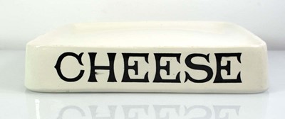 Lot 201 - A grocers 'Cheese' stand by G. Rushbrooke of...