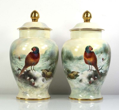 Lot 202 - A pair of limited edition Coalport covered...