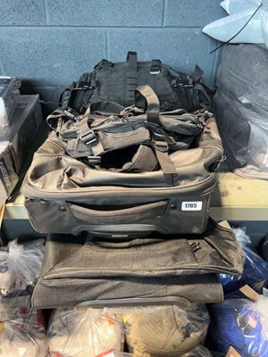Lot 1765 - 2 various wheeled duffels and 1 rucksack (all...