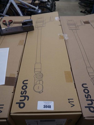 Lot 3048 - Boxed Dyson V11 Extra cordless stick vacuum...