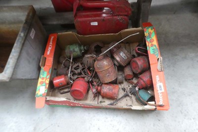 Lot 2307 - Red crate containing vintage oil cans