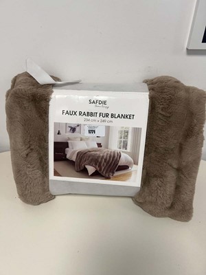 Lot 1771 - A Safdie Home Living faux rabbit fur blanket.