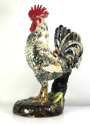 Lot 212 - A Delphin Massier majolica vase/stand modelled...