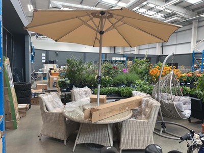 Lot Beige rattan garden suite inc. circular glass...