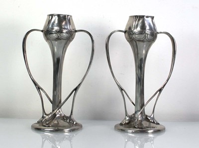 Lot 99 - A pair of Arts & Crafts pewter vases by A.E....