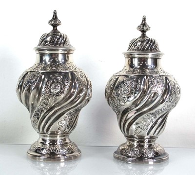Lot 362 - A pair of George III silver caddies of urn...