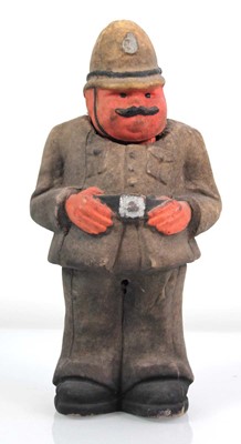 Lot 118 - A papier mache figure modelled as a policeman,...