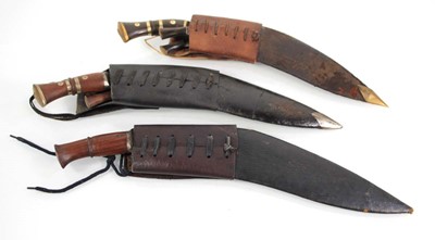 Lot 120 - A group of three 20th century kukris with...