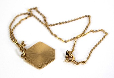 Lot 786 - A yellow metal chainlink necklace suspending...