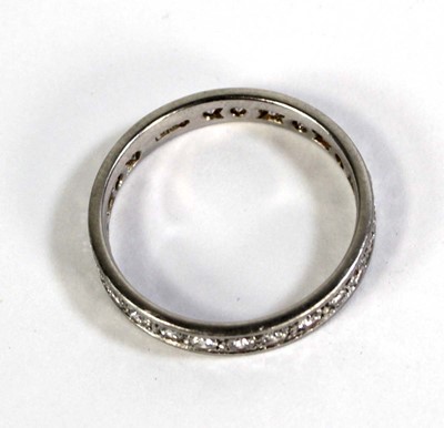 Lot 792 - A platinum full eternity ring set small...