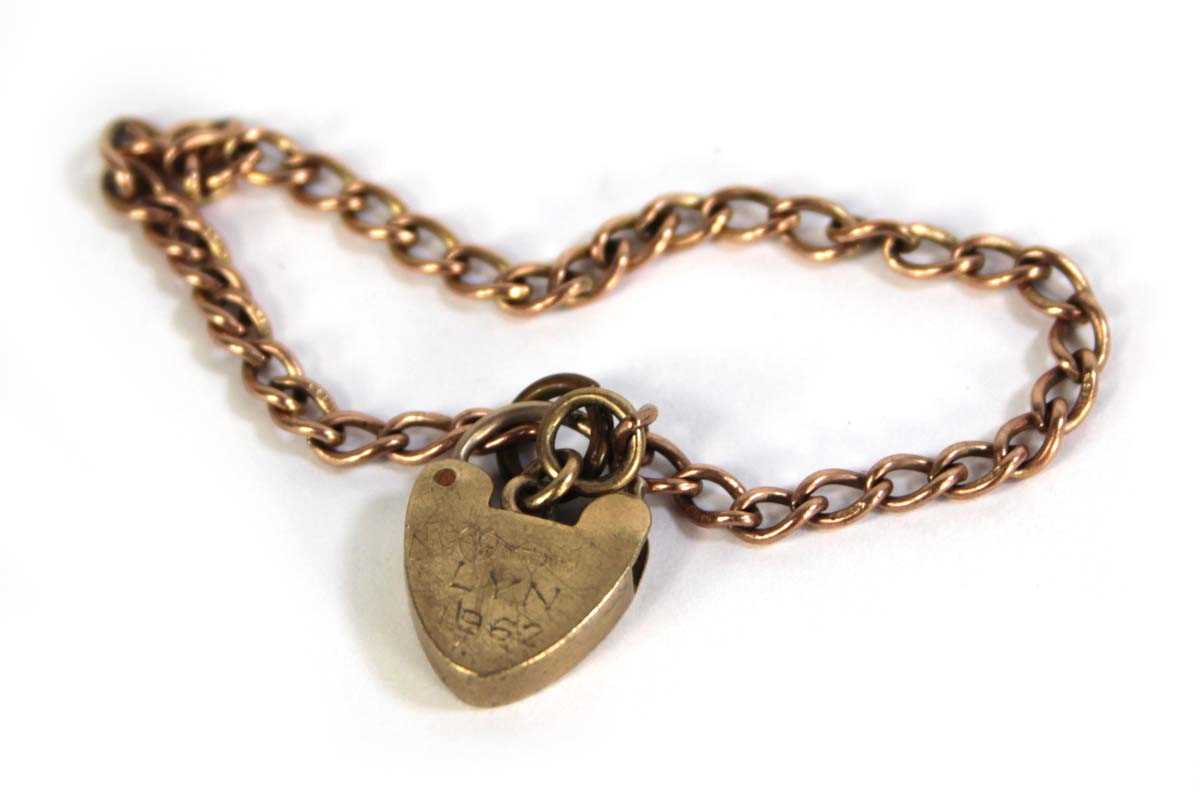 Lot 794 - A 9ct yellow gold child's bracelet with heart...