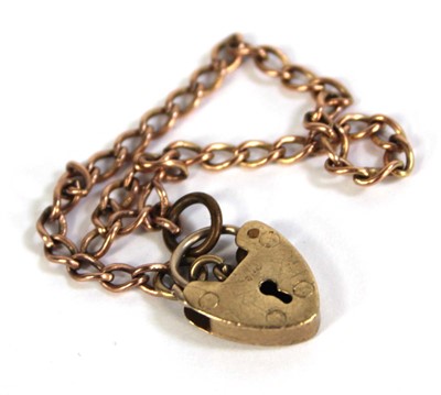 Lot 794 - A 9ct yellow gold child's bracelet with heart...