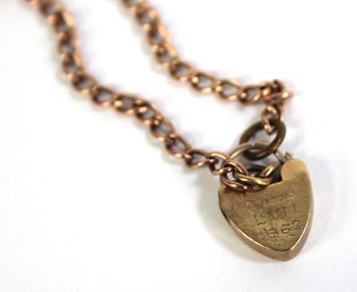 Lot 794 - A 9ct yellow gold child's bracelet with heart...