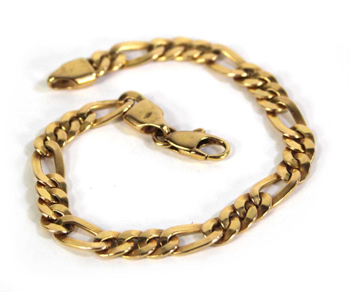 Lot 796 - A 9ct yellow gold figaro link bracelet with...