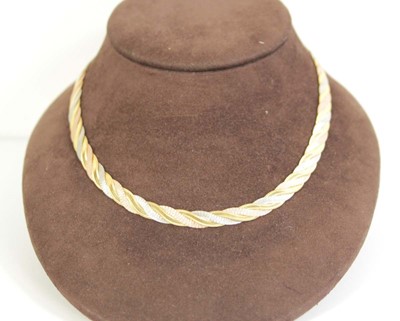 Lot 800 - A 9ct tri-colour flat ropetwist necklace, l....