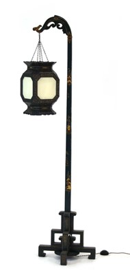 Lot 4 - A 20th century standard lamp decorated in the...