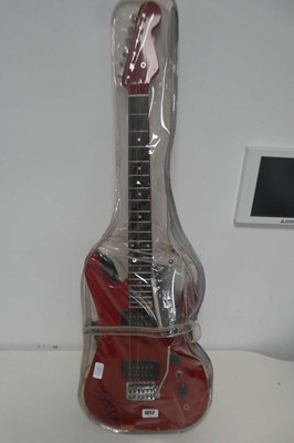 Lot 1052 - Red Axe electric guitar with 2 instructional...