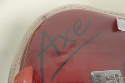 Lot 1052 - Red Axe electric guitar with 2 instructional...