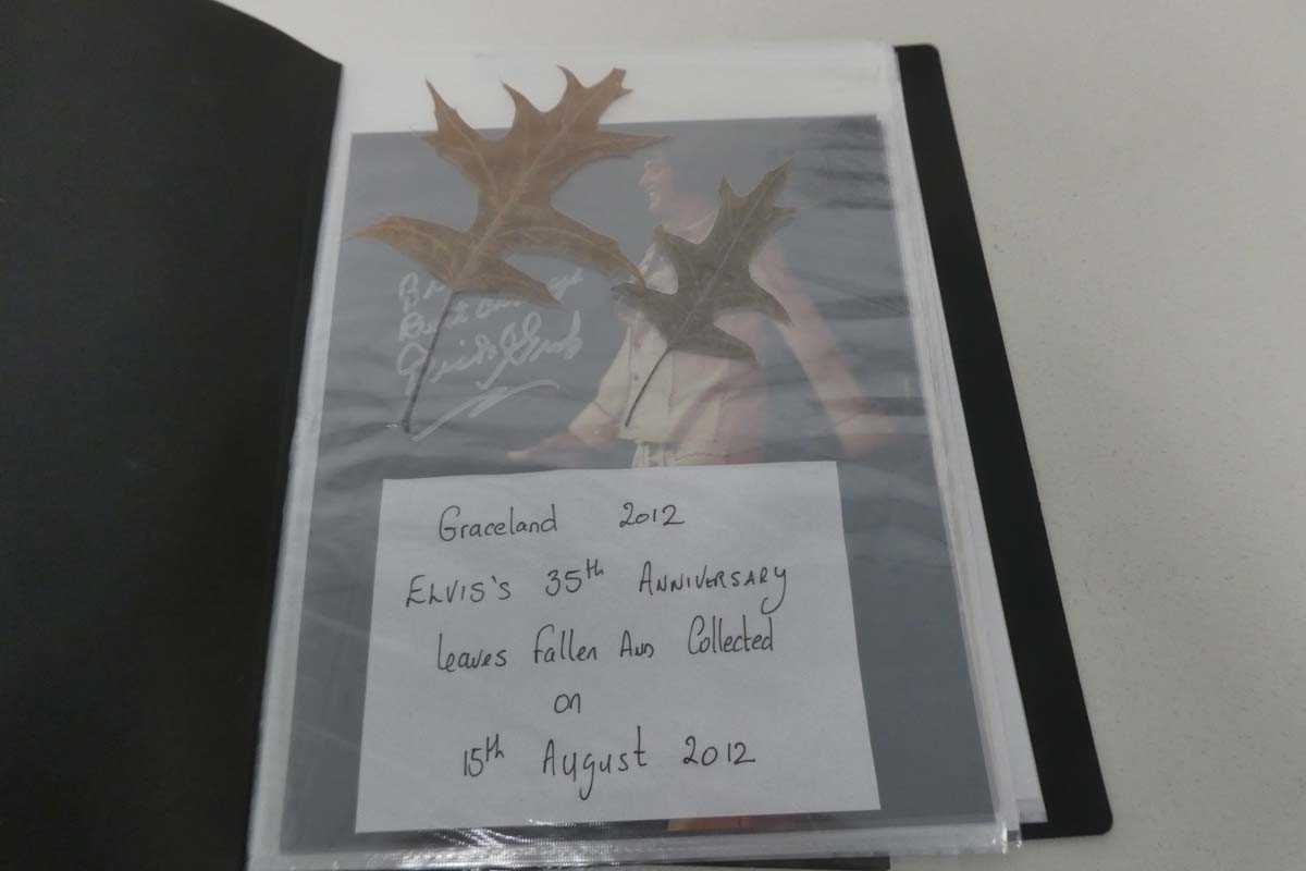 Lot 1075 - Folder of photos of Elvis Presley autographed...