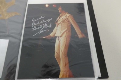 Lot 1075 - Folder of photos of Elvis Presley autographed...