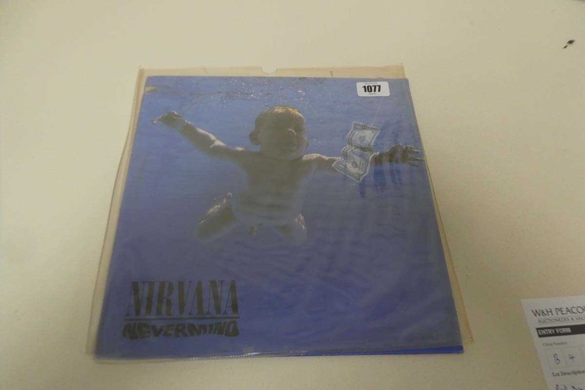 Lot 1077 - Nirvana Nevermind unofficial release in yellow...