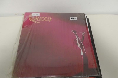 Lot 1081 - Box and stack of vinyl albums incl. Queen,...