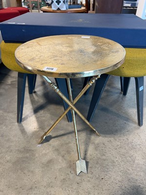 Lot 1179 - Small round side table with arrow inspired legs