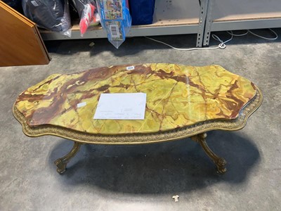 Lot 1233 - Marble top coffee table on brass metal support