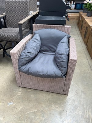 Lot 2013 - Brown rattan single garden armchair with dark...