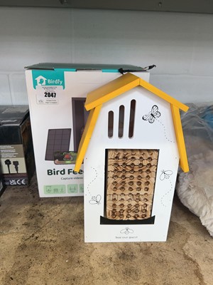 Lot 2047 - Boxed bird feeder camera together with a bee...