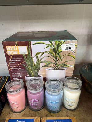 Lot 2058 - Boxed 2 piece ceramic plant pot set together...