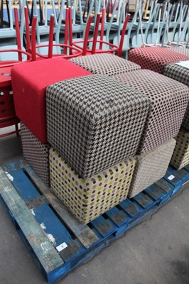 Lot 22 - 8 patterned low stools/pouffes