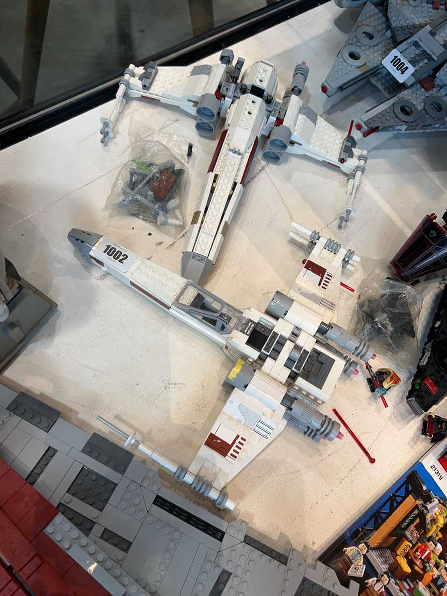 Lot 1002 - 2 Lego Star Wars X-Wing star fighters models...