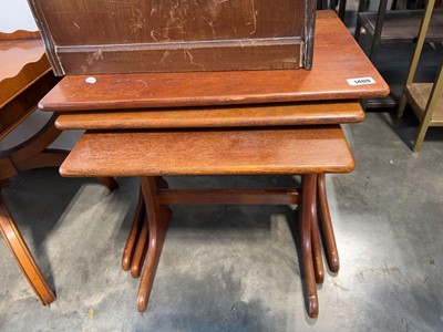 Lot 1409 - Mid century teak nest of 3 coffee tables