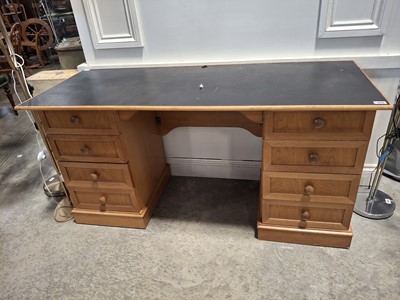 Lot 1419 - Honey oak finish twin pedestal desk with black...