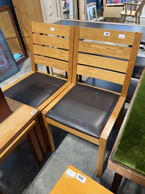 Lot 1412 - Pair of honey oak dining chairs with black...